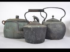 Two vintage early 20th century large copper kettles along with a large vintage copper lidded pan of