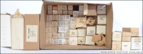 A collection of vintage old new stock radio valves,