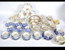 A 1930's Art Deco ceramic Breakfast set by Bristol. The plate base with whicker handle and egg cups.