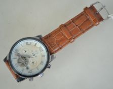 A contemporary Prince of London wristwatch. Set to a leather strap with open face.