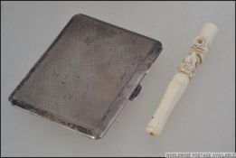 A silver hallmarked Cheroot / card case with hinged lid and engine turned design bearing assay mark