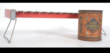 An antique Sharps toffee tin money box together with a Fairytale xylophone