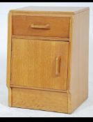 A vintage 1950's G - Plan oak bedside cabinet along with a stunning vintage gooseneck desk lamp