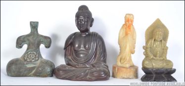 A collection oriental - Chinese figurines to include soapstone buddha in lotus position,