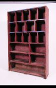 A vintage industrial mid 20th century painted pine store parts pigeon hole cupboard having