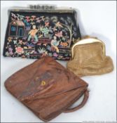 A collection of three early 20th century evening / clutch bags to include a Japanese silk bag,