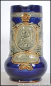A Royal Doulton Lambeth Jug. Commemorating the 1905 Centenary of the Death of Lord Nelson.