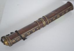 A 20th century Tibetan copper scroll holder,