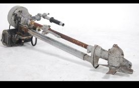 A stunning vintage mid 20th century British made Seagull outboard boat motor with mounting clamps,