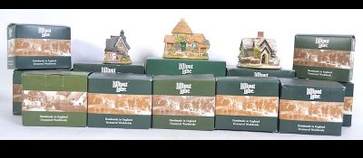 A collection of twelve Lilliput lane cottages.