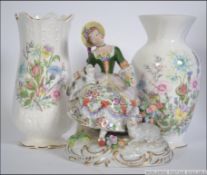 A pair of 20th century boxed Aynsley ceramic vases along with a Austrian Dresden style figurine