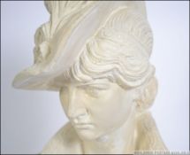 A large plaster bust - study of a burlesque maiden raised on a socle plinth base.