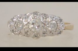 A hallmarked 18ct gold and illusion set diamond ring with approx 40pts diamonds. Hallmarked London.