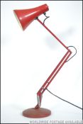 A vintage Herbert Terry post war anglepoise desk lamp in original red paint.