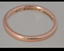 A hallmarked 9ct gold band ring hallmarked Birmingham. Weight 2.7g. Size N.5.