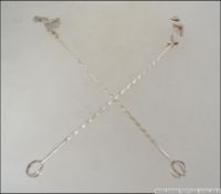 A pair of believed Christian Bauer Danish silver 925 twizzle cocktail stick having twist stems with