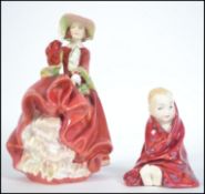 A Royal Doulton Bone China figurine ' Top O The Hill ' HN1834 together with ' This Little Pig '