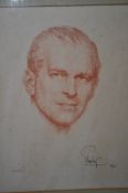 A framed and glazed pastel portrait print of H.R.H The Duke Of Edinburgh K.G by Leonard Boden.