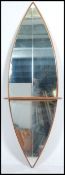 A 1960's full sized floor standing teak wood surfboard mirror.