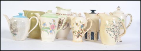 A collection of vintage 20th century teapots to include Royal Doulton, Grimwades, Wedgwood,