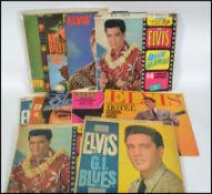 A collection of Elvis Presley records dating from the 1950's to include labels RCA Victor - Mono