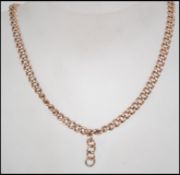 A 9ct rose gold fob watch chain marked 9 375. Maker J.G &S. Measures approx 16.5 inches.