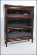 A 1920's Edwardian Globe Wernicke oak three tier sectional lawyers bookcase with glazed up and