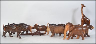 A collection of 20th century African hard wood carvings of animals to include hippo's elephants etc