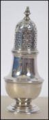 A Victorian silver hallmarked pepper pot by D & J Wellby Limited, Hallmarked for London 1907.
