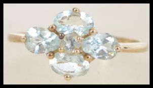 A 9ct gold and topaz cluster ring. Weight 1.9g. Size S.