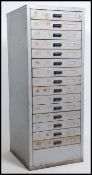 A large 14 drawer metal industrial 20th century pedestal chest cabinet by Amersham of Bristol Ltd.