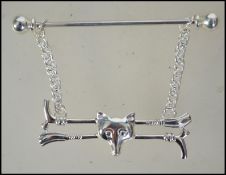 A gentlemans silver cravat - tie pin in the form of a fox - hunting interest. Total weight 8.8g.