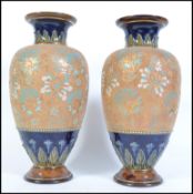 A pair of large early 20th century Doulton Lambeth stoneware glazed baluster vases impressed stamp