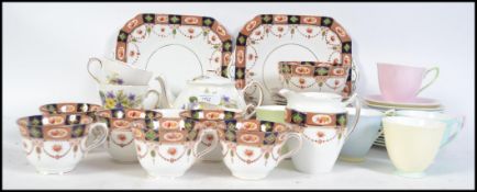 A Royal Albert Multi-coloured part tea service comprising cups,