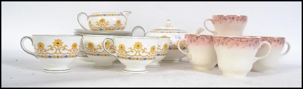 A vintage 20th century transfer printed with hand painted finish Wedgwood part tea service with
