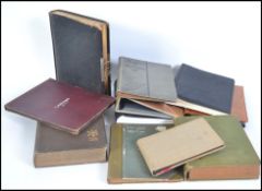 A collection of vintage early 20th century postcard - photograph albums to i include Art Nouveau