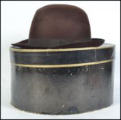 A vintage mid 20th century boxed brown Fedora hat by Churchill Ltd.
