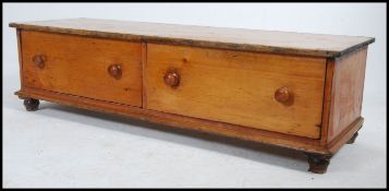 A large 19th century pine end of bed chest of drawers.
