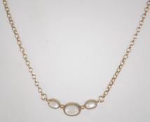 A ladies 9ct gold and moonstone necklace. Length 36cms / weight 8.