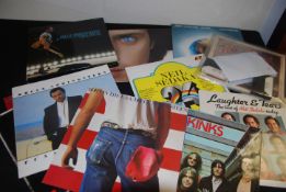 A collection of vinyl long play records to include The Kinks, Jean Michelle Jarre x several,