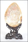 A stunning late 19th century early 20th century Chinese carved mother of pearl shell having fret