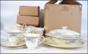 A Royal Doulton ' Juliet ' pattern extensive dinner and tea service from the Romance Collection.