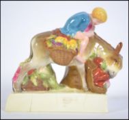 A rare Royal Worcester figurine modelled by Stella. R.