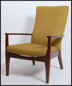 A vintage mid century Parker Knoll armchair model no PK988 The chair with squared legs and shaped
