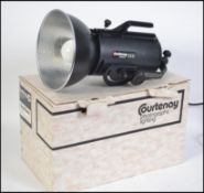 A contemporary boxed Courtenay solar flash 1000 camera light. In original box with instructions.