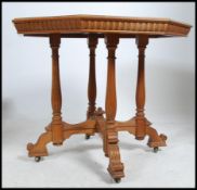 A 19th century Victorian solid oak centre table of octagonal form in the manner of gillows being