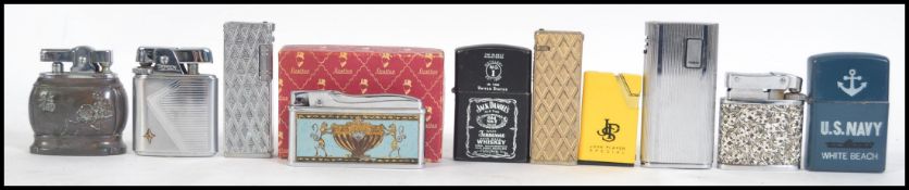 A collection of lighters to include copper table lighter, Banthen-Lite Japan, Champ, Ronson,