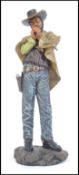 A good composite figure of Clint Eastwood classic pose with cigar and poncho as Joe from the