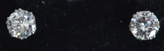 A pair of 18ct white gold and round cut diamond stud earrings of approximately 2cts. Total weight 2.