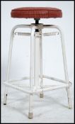 A vintage mid 20th century industrial stool.